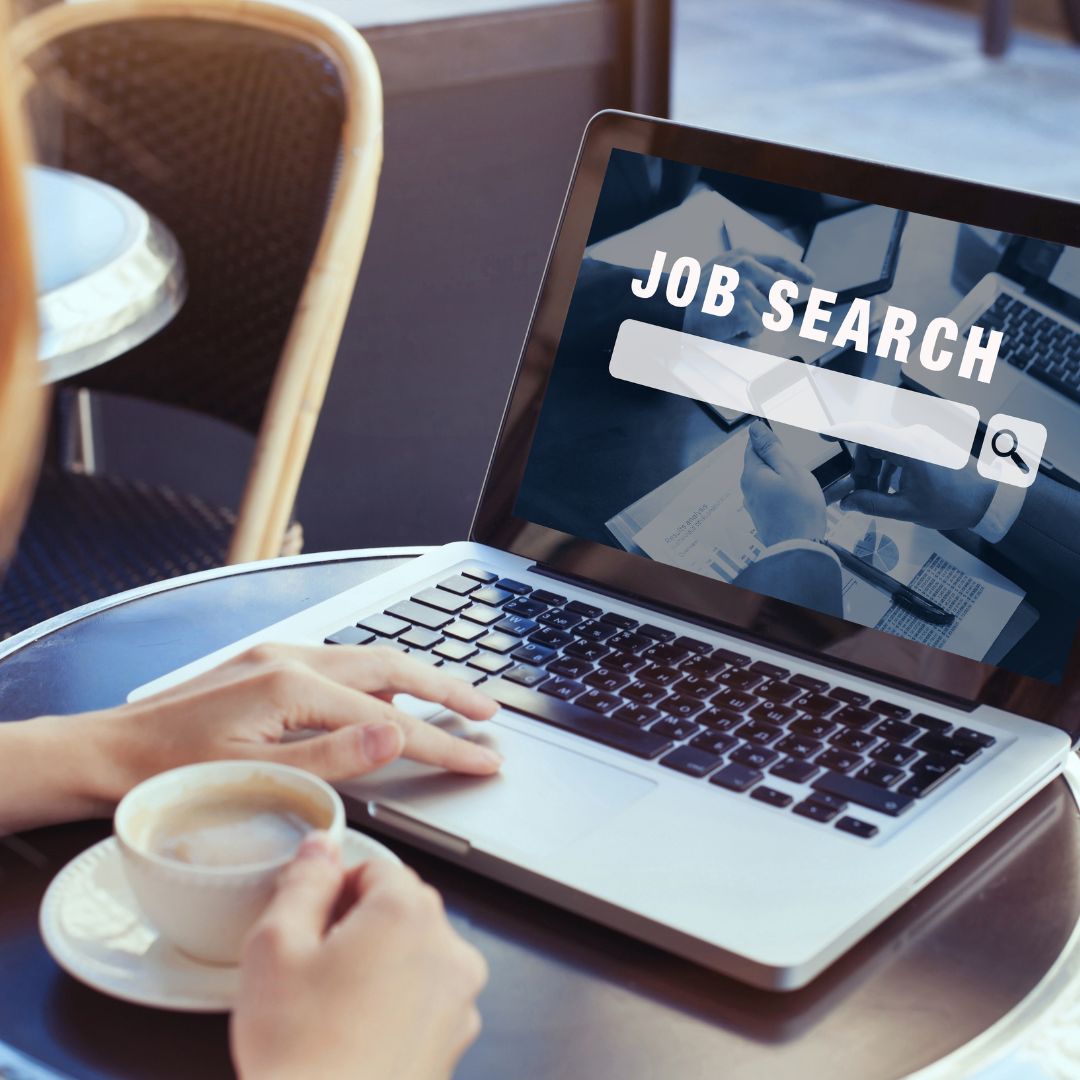 someone searching for jobs on a laptop