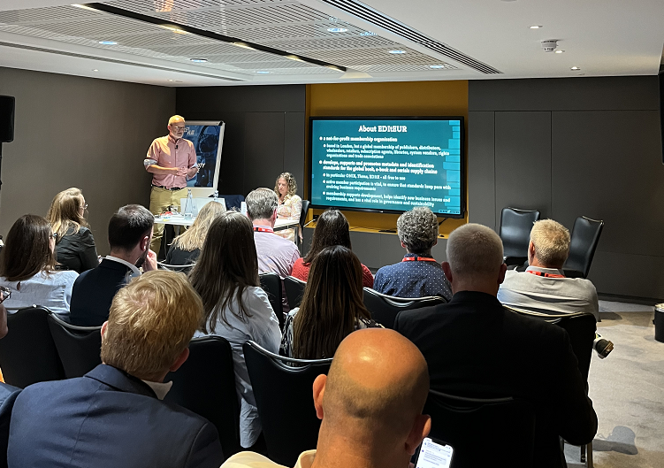 Image of a packed room listening to a talk at the IPG Conference